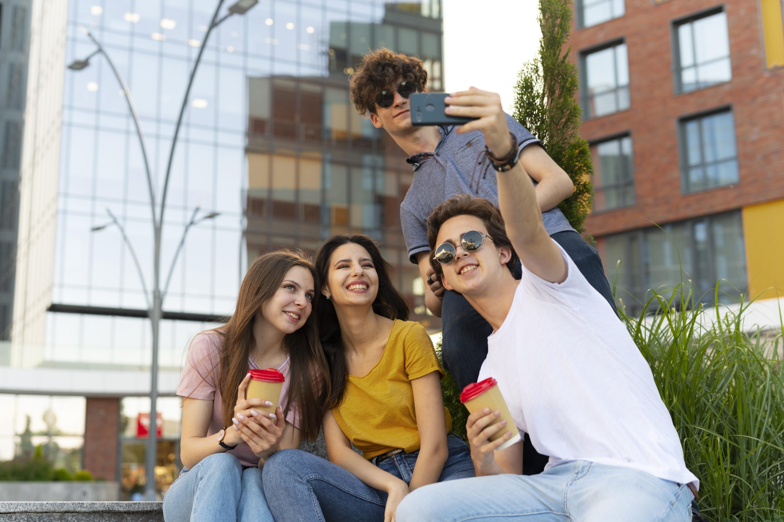 influencers-taking-selfie-outdoors-while-having-coffee